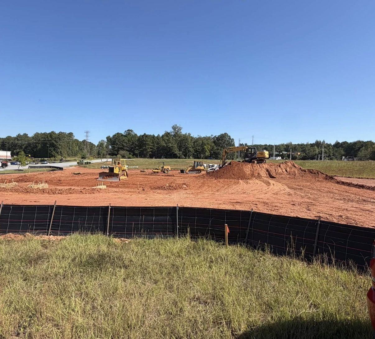 Silt fence installed around a commercial site being graded